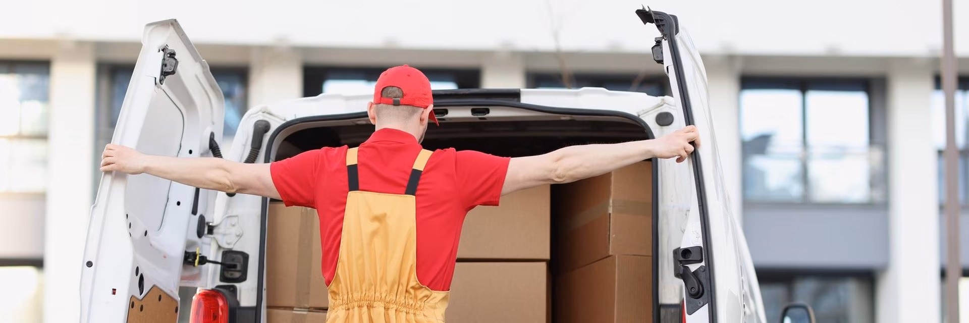 Top Grade Movers loading boxes into a van